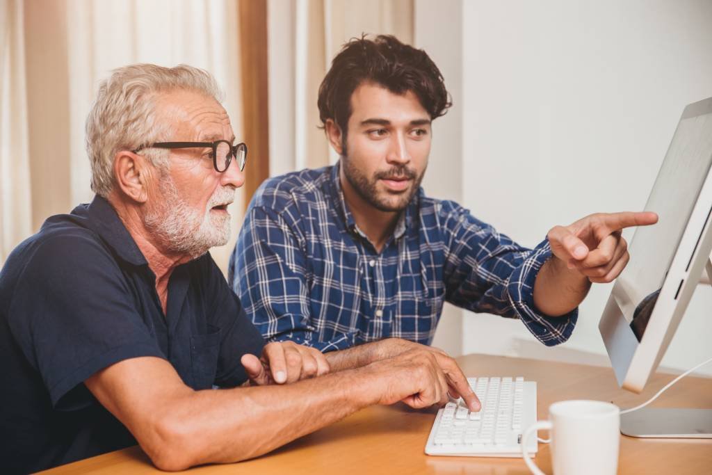 Senior man holding piggy bank for financial savings campaign