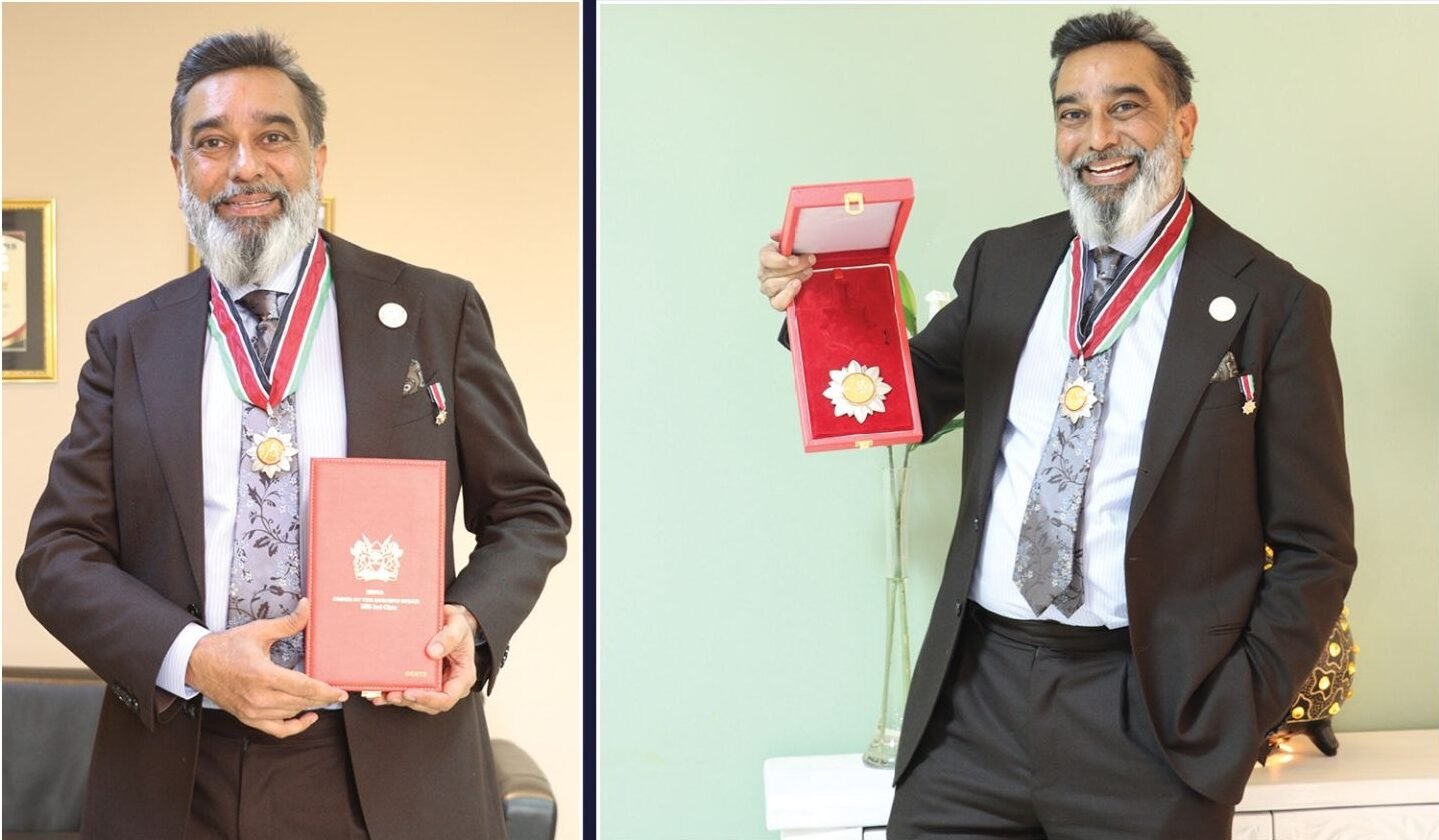 Dr. Amit N. Thakker receiving the Elder of the Order of the Burning Spear Award