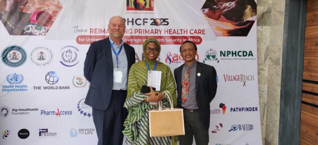 Andy Bleaden with Hannatu Ayuba and Dr Francis Ohanyido