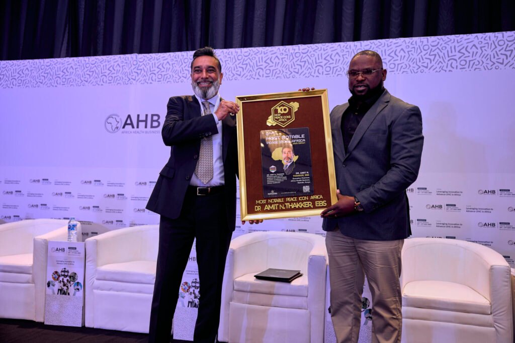 Dr Amit Thakker receiving the Africa’s 100 Most Notable Peace Icons Award